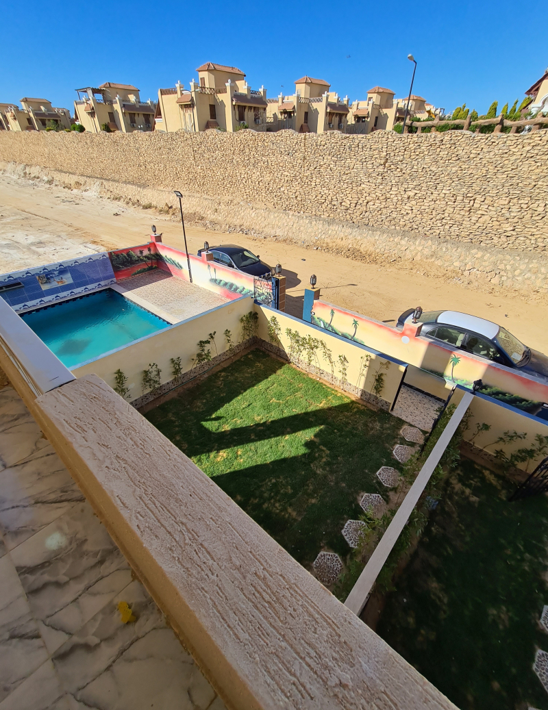 شاليه_ اول علوي_ بسلم داخلي للبيع بالتقسيط #بالساحل_الشمالي و بحمام سباحه خاصه على  مساحة 200 م بروف