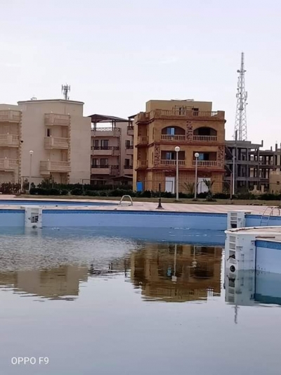 شالية بقرية بدر  متر² دور ارضى بحديقة
